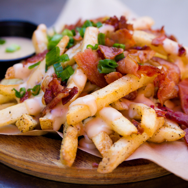 Dutchman, dirty fries with cheese, bacon and spring onions