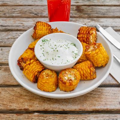 Mini corn on the cob, with dip.
