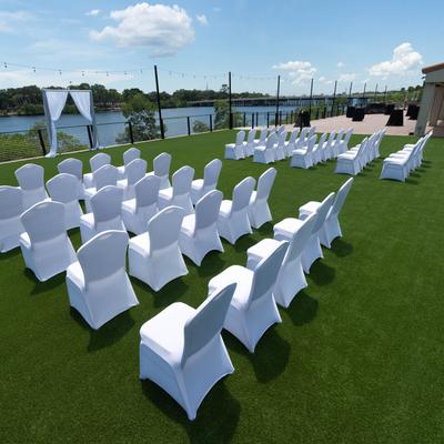 Exterior, wedding venue, seating set on a lawn.