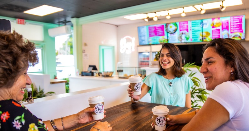 Customers chatting and drinking beverages