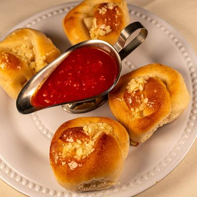 Garlic Knots served with marinara sauce.