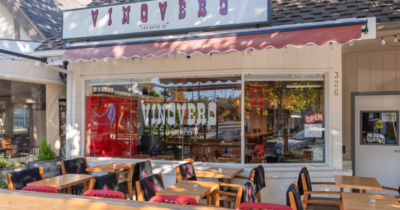 Outdoor seating area in front of the restaurant entrance