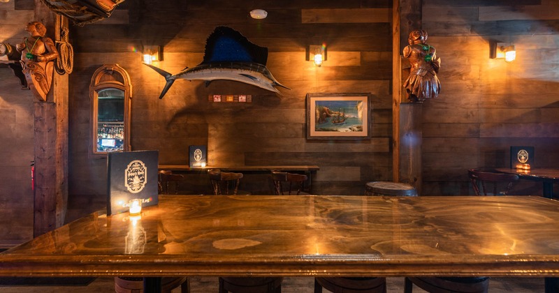 Interior, a long table, wall decorations