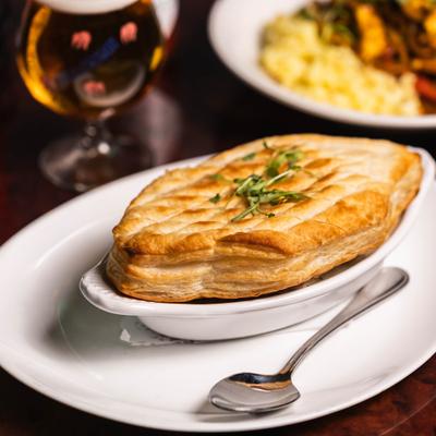 Chicken pot pie with puff pastry.