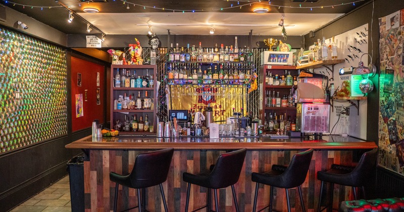 Interior, bar, stools, drink rack above