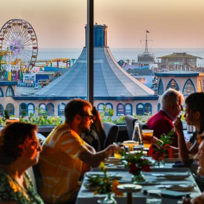 This image shows the amazing view of the Santa Monica Pier from the dining room of The Lobster!.