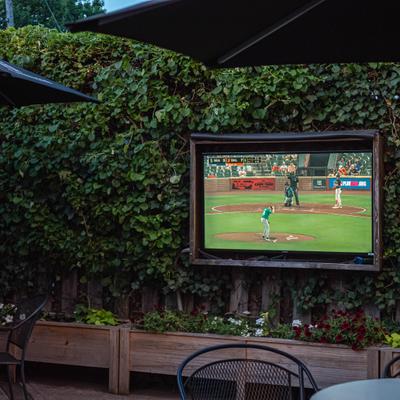 Television set showing a baseball game.