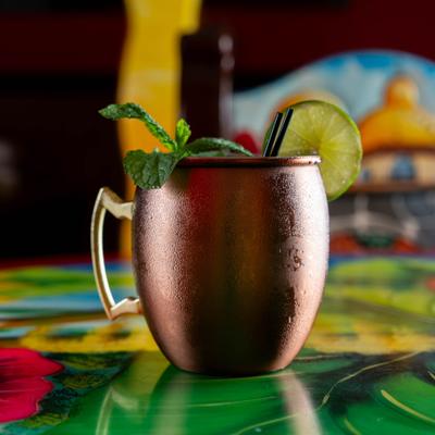 Cocktail in copper mug.