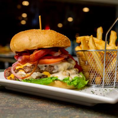 The Nest Burger serve with side of fries.