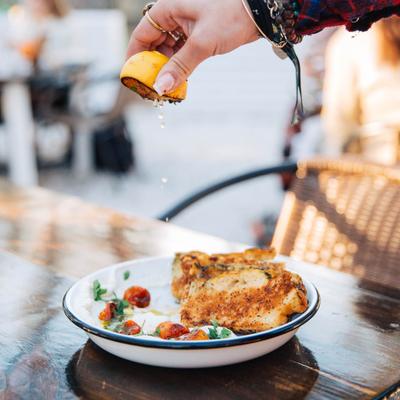 Whipped Ricotta, with charred tomatoes, herb oil, chili honey, and toasted foccacia.