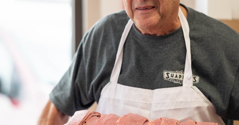 Partial view of a kitchen staff member