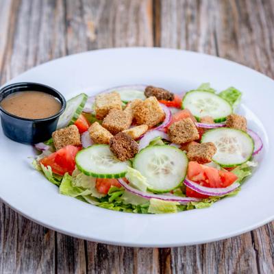 Garden Salad served with dressing on the side.