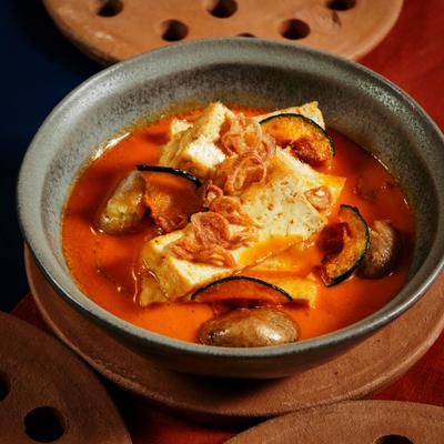 Tofu,mushroom, and zucchini soup.