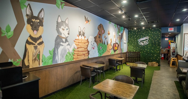 Interior, seating and tables, a wall mural with painted dogs