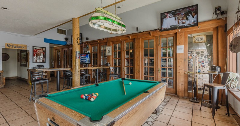 Interior, pool table in seating area