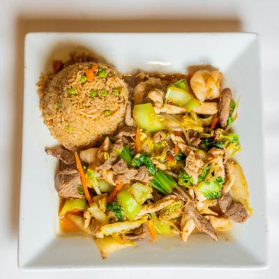 Fried rice, with shrimp, beef, chicken, Vietnamese sausage, and vegetables.