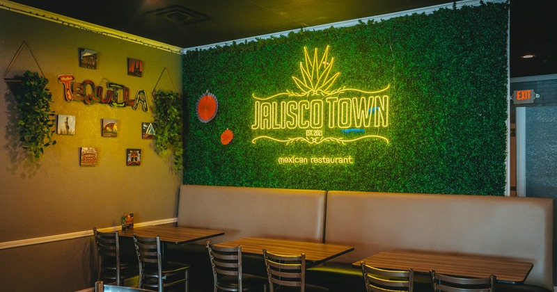 Interior, chairs and tables, neon sign on the wall