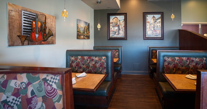 Interior, dining booths, pictures on the walls