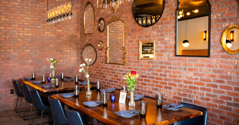 Interior, dining area, wall decorated with mirrors