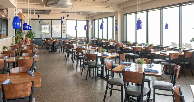 Interior, main seating space, tables ready for guests