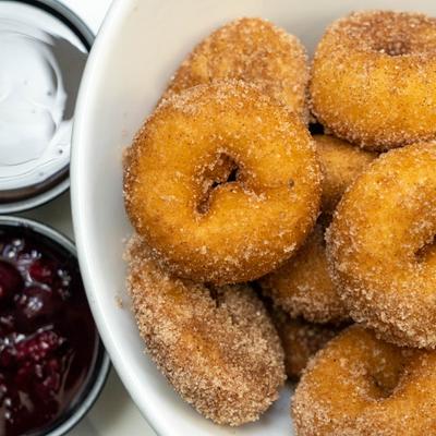 Mini Donuts served with chocolate sauce and berry compote.