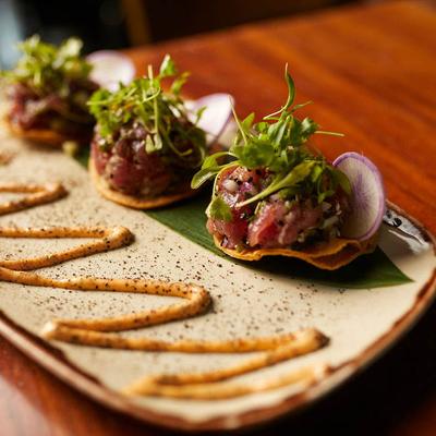 Ahi tuna tostadas, with salsa, herbs, and spices.
