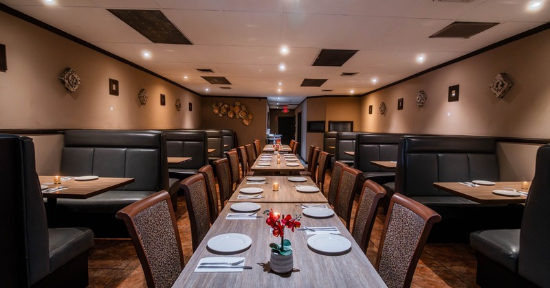 Interior, set tables and chairs ready for guests