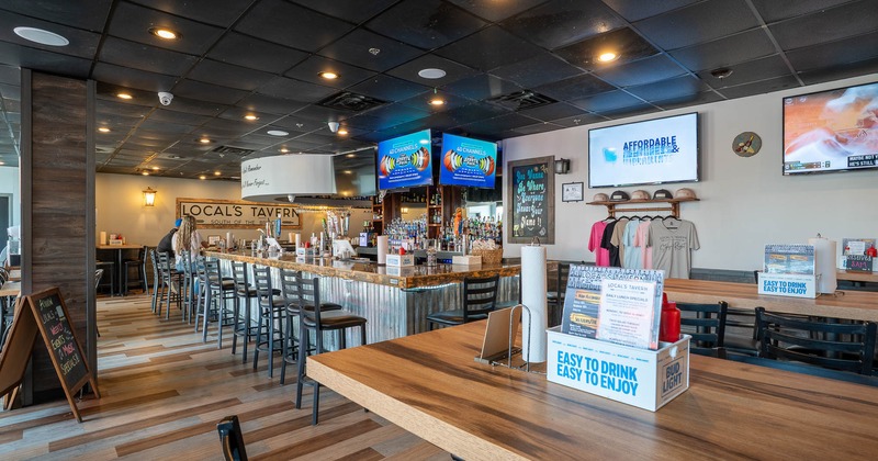 Interior, tables and chairs ready for guests