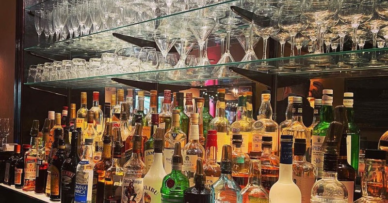 Interior, back bar spirits and glasses for different drink types