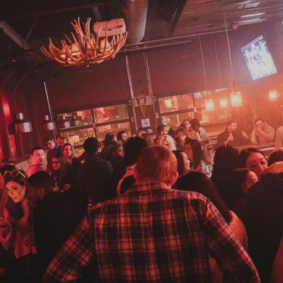 Guests having fun, restaurant interior