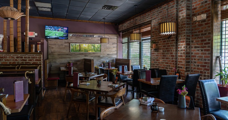 Interior, red brick wall dining area