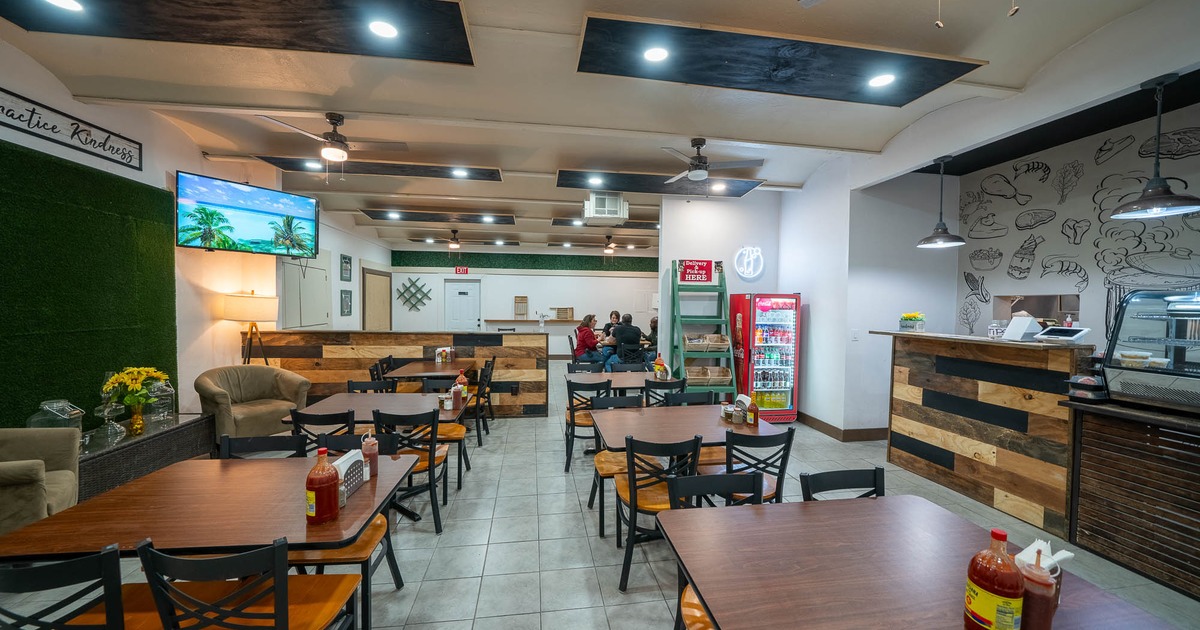 Interior, tables and chairs ready for guests