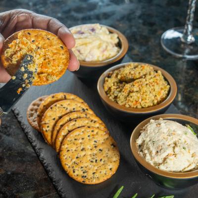 Crackers with three different spreads.