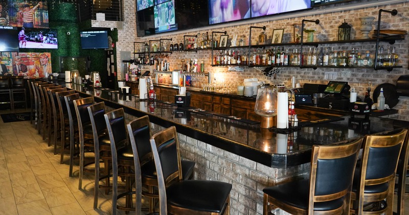 Interior, bar area with leather bar stools