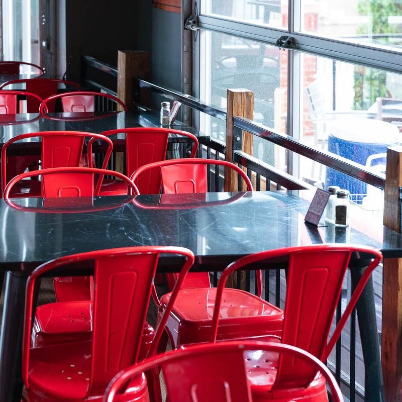 Interior, tables and chairs ready for guests