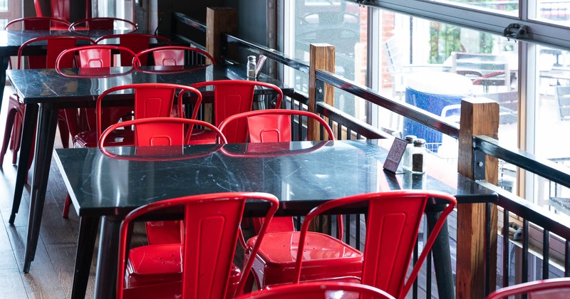 Interior, tables and chairs ready for guests