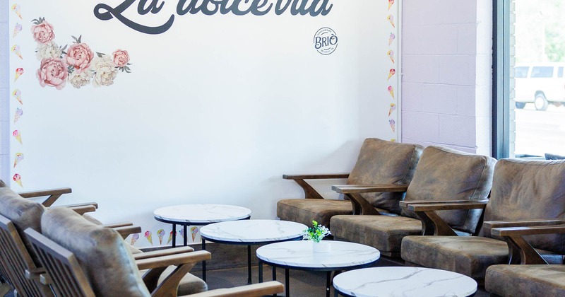 Cozy cafe corner with brown chairs, marble-top tables