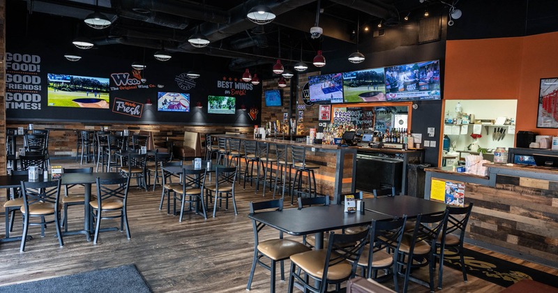 Interior, seating area with a bar in the back