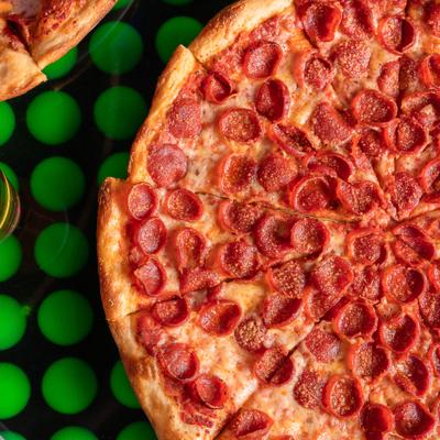 Served pizza with pepperoni.