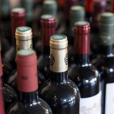 Collection of corked wine bottles.