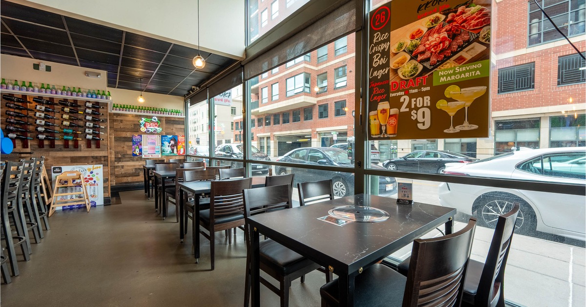 Interior, dining area, seating by the shop window, Korean BBQ tables for four people