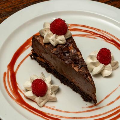 Chocolate mousse cake piece, closeup.