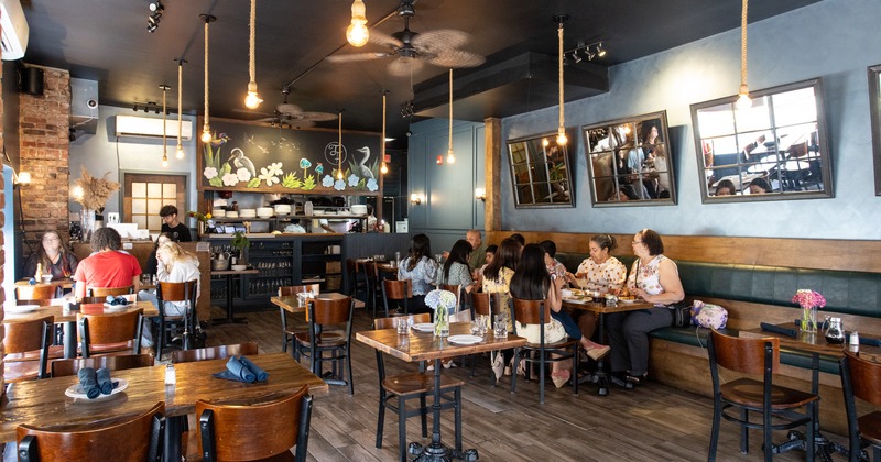 Interior, diner area, tables and chairs, people