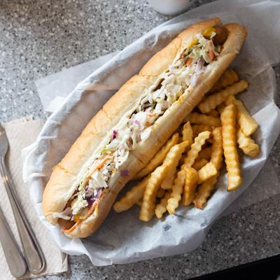 Foot long hot dog and fries.