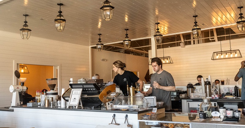 Interior, staff at coffee bar counter