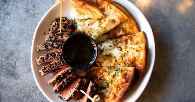 Seared steak, pizza bread and dip