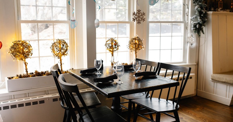 Interior, table for four ready for guests