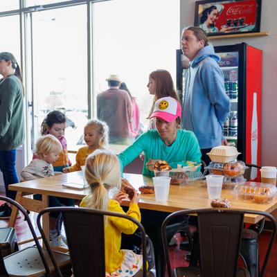 A group of children enjoying snacks.