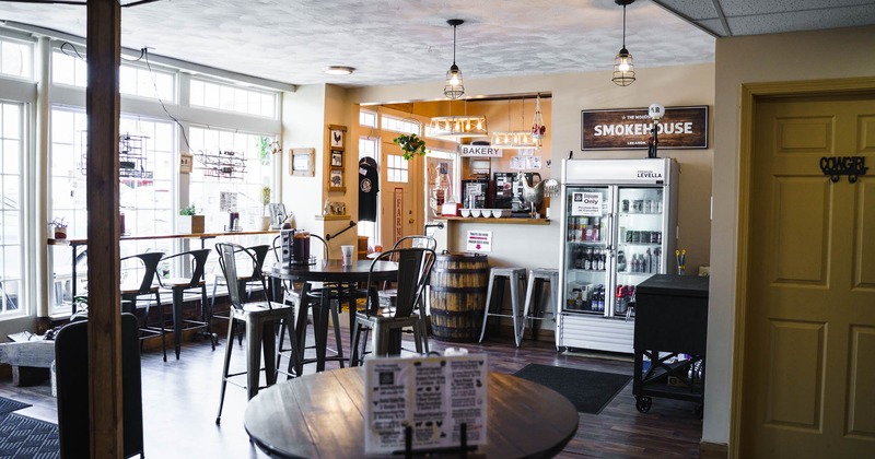 Interior, wide look to the diner area with a bar behind