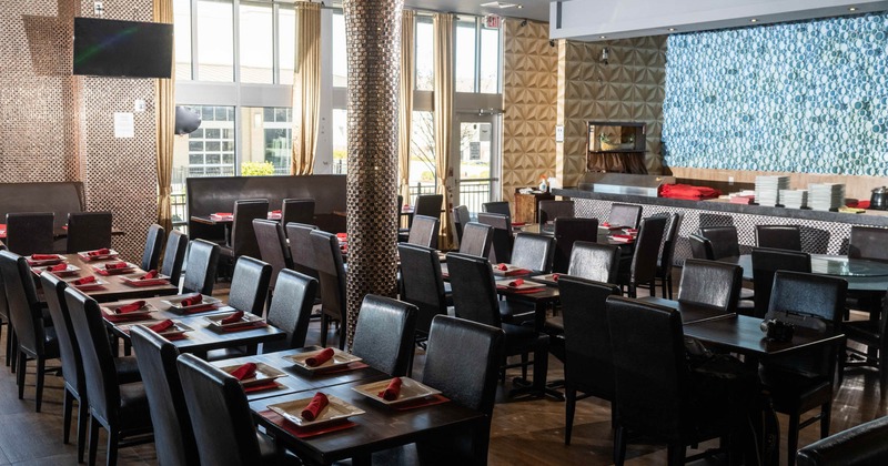 Interior, dining area with leather chairs and tables